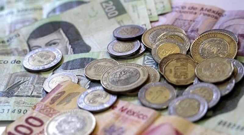 Dinheiro vivo e pesos mexicanos em espécie em Tulum